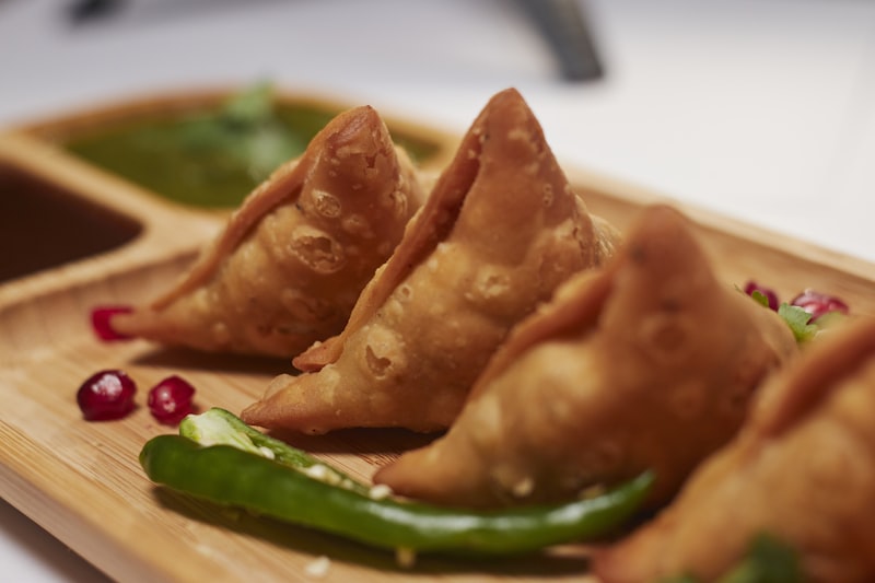 Warm jhol momo dumplings in a spiced peanut-based soup