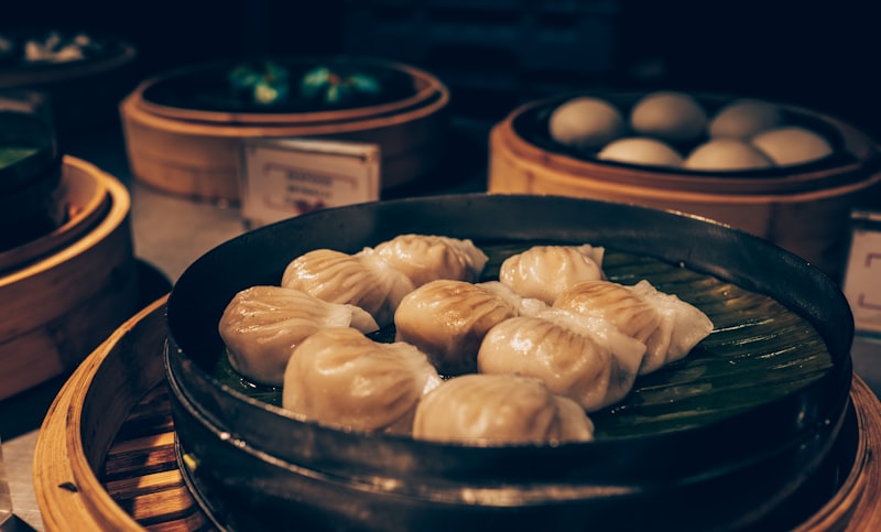 Steamed Nepali momo dumplings served with achar dipping sauce